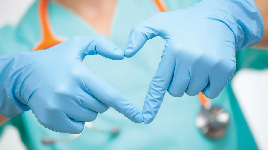Doctor's hands in the shape of a heart